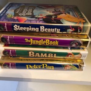 Four Disney VHS tapes
